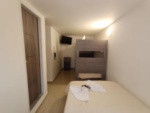 Postel nebo postele na pokoji v ubytování HOSPEDAJE SiLOM + 17 fotografií