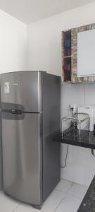 Kuchyň nebo kuchyňský kout v ubytování Excelente apartamento em Lauro de Freitas