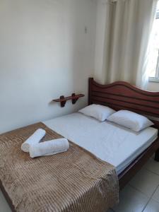 Ліжко або ліжка в номері Apartamento em Lauro de Freitas bem localizado
