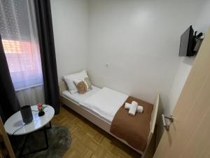 Postel nebo postele na pokoji v ubytování For5