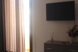 TV a/nebo společenská místnost v ubytování Annalè