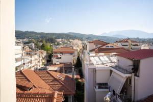 a view of a city with houses and roofs at Kostis Luxury Apartment in Agrinio