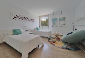 A bed or beds in a room at Villa Purpura Panoramic