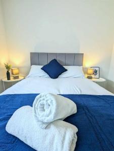 Cama ou camas em um quarto em Gorgeous Thetford Retreat