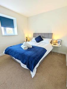 Cama ou camas em um quarto em Gorgeous Thetford Retreat