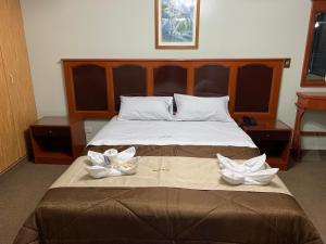 Postel nebo postele na pokoji v ubytování Grand Hotel Betsy + 32 fotografií
