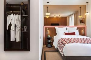 Postel nebo postele na pokoji v ubytování Artizan - Design Hotel