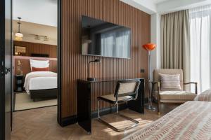 Postel nebo postele na pokoji v ubytování Artizan - Design Hotel