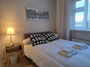 Postel nebo postele na pokoji v ubytování Lochview House - 3 bed