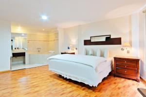 Voodi või voodid majutusasutuse Hotel LP Columbus toas