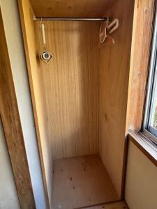 a small shower in a room next to a window at Togaku Hokosha - Vacation STAY 15781 in Nagano