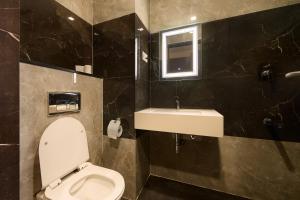 Koupelna v ubytování Hotel Merrytale