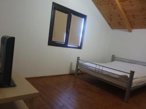 Postel nebo postele na pokoji v ubytování Family Keyhouse + 1 fotografie