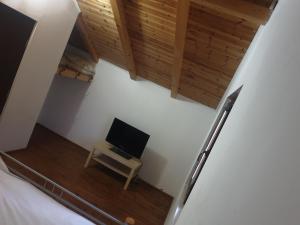 TV a/nebo společenská místnost v ubytování Family Keyhouse