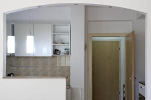 Kuchyň nebo kuchyňský kout v ubytování Hana Apartment Ohrid