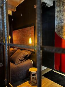 Postel nebo postele na pokoji v ubytování Gîte Sept Fontaines * Jacuzzi & Sauna