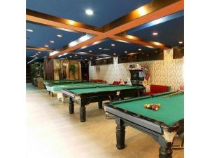 a row of pool tables in a billiard room at Houraku - Vacation STAY 23297v in Kamikawa