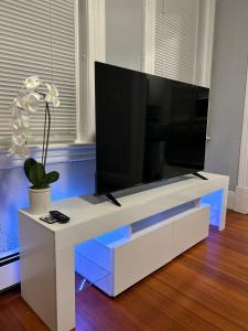 A television and/or entertainment centre at TEH RENTERS GROUP