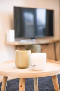 TV i/ili multimedijalni sistem u objektu Cosy Chalet Vue & Nature Durbuy