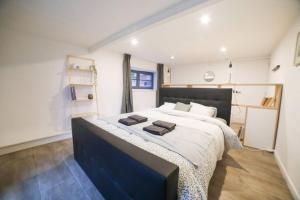 Krevet ili kreveti u jedinici u okviru objekta Cosy Chalet Vue & Nature Durbuy