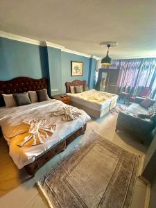 מיטה או מיטות בחדר ב-Sultanahmet Raydon Old City Hotel