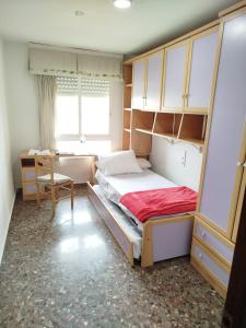 Llit o llits en una habitació de Ushuaia
