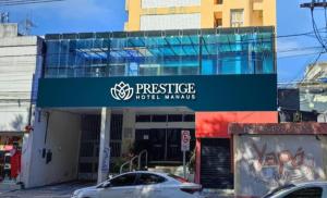 a building with a sign that reads prestige hotelwyn at Prestige Manaus Hotel in Manaus