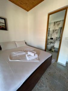 Postel nebo postele na pokoji v ubytování Vila Elite