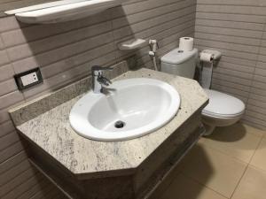 a bathroom with a sink and a toilet at Laguna house in Dahab