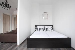 Posteľ alebo postele v izbe v ubytovaní Stylowy apartament w najlepszej lokalizacji