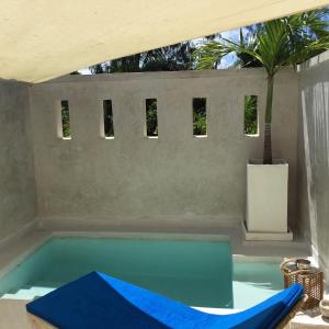 Bazén v ubytování The Villa Luxury Suites Hotel nebo v jeho okolí