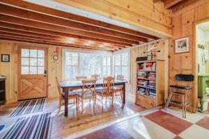 a dining room with a table and chairs at Spacious Classic Cabin Retreat- near Lassen in Mill Creek
