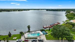 an aerial view of a lake with a swimming pool at Gorgeous Property at Winter Park in Orlando