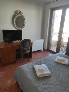 Ένα ή περισσότερα κρεβάτια σε δωμάτιο στο Garni Hotel Meduza