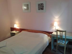 Postel nebo postele na pokoji v ubytování Bed Breakfast Hotel Budapest