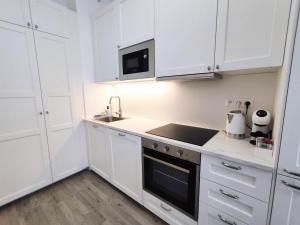 Køkken eller tekøkken på Wings - Brand New - Presidential Garden - Free Parking