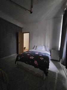Postel nebo postele na pokoji v ubytování Nomads Hostel Multicultural & Coworking