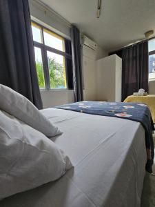 Postel nebo postele na pokoji v ubytování Nomads Hostel Multicultural & Coworking
