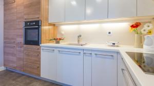 Kuchyňa alebo kuchynka v ubytovaní Apartment Mair + 21 fotografií