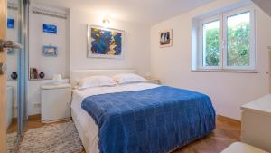 Posteľ alebo postele v izbe v ubytovaní Apartment Mair