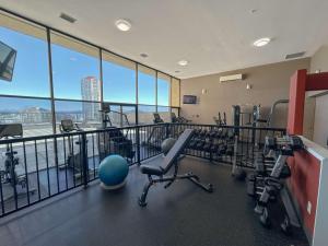 a gym with treadmills and exercise equipment in a building at Coast Bastion Hotel in Nanaimo