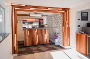 A kitchen or kitchenette at Coast Metro Vancouver Hotel