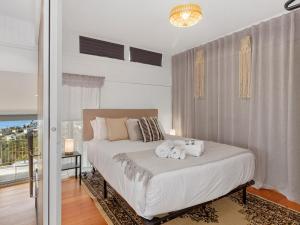 Ένα ή περισσότερα κρεβάτια σε δωμάτιο στο Spectacular Views - 2 Bedroom House
