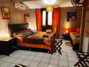 Letto o letti in una camera di Fare D'hôtes Tutehau