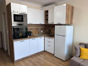 Kuchyň nebo kuchyňský kout v ubytování Апартаменти Bella Deluxe