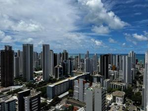 an aerial view of a city with tall buildings at Hosts BR - Flat Beach Class Boa Viagem (sem taxas) in Recife