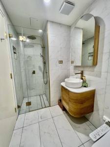 a bathroom with a sink and a shower at Ultimo in Sydney