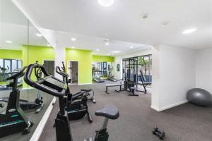 a gym with several treadmills and exercise bikes at Ultimo in Sydney