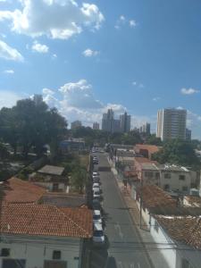 a view of a city street with cars parked at Aluguel por temporada em Cuiabá in Cuiabá