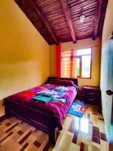 Postel nebo postele na pokoji v ubytování Hostal El Inca